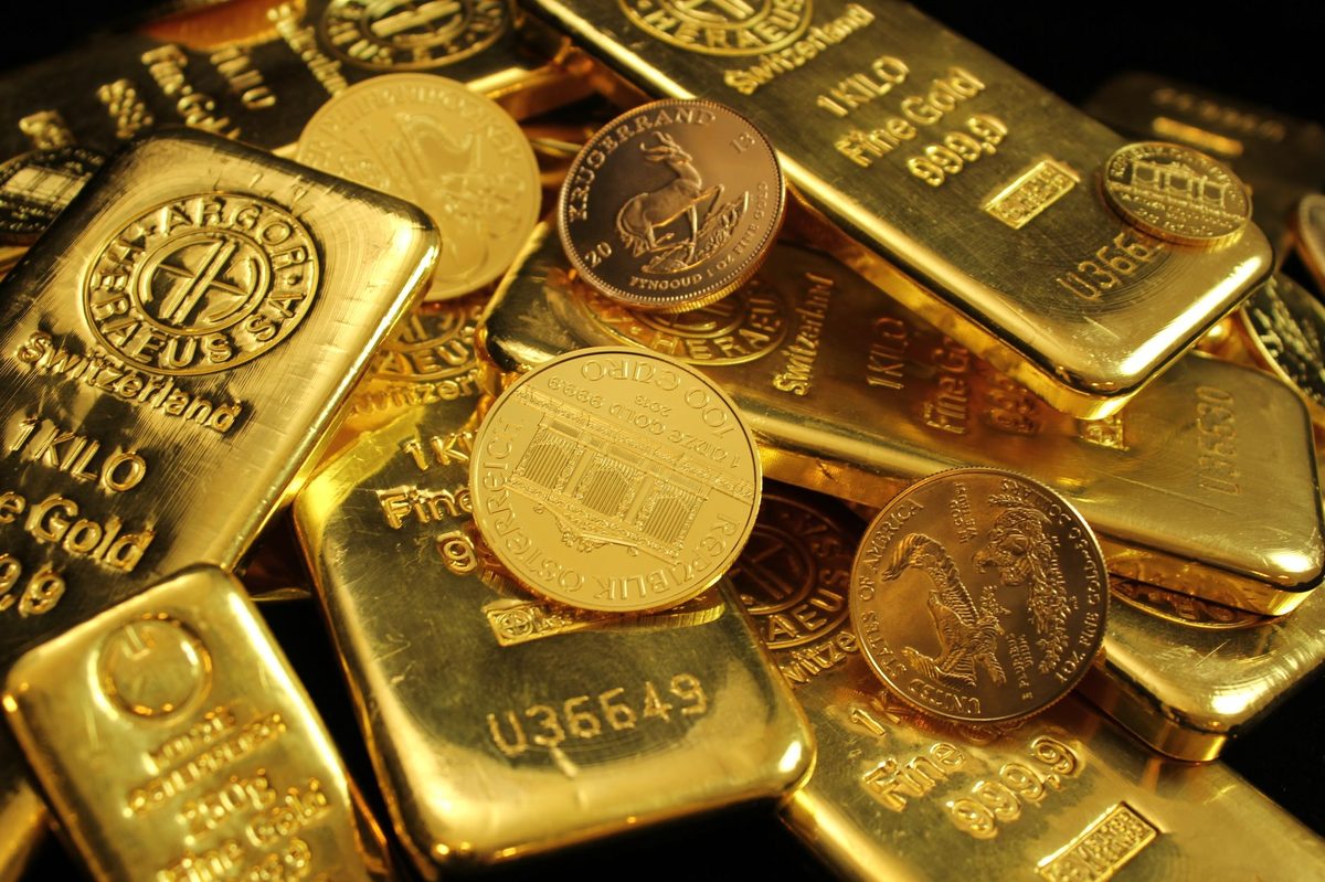 Gold bars in a vault representing physical gold ETF investment