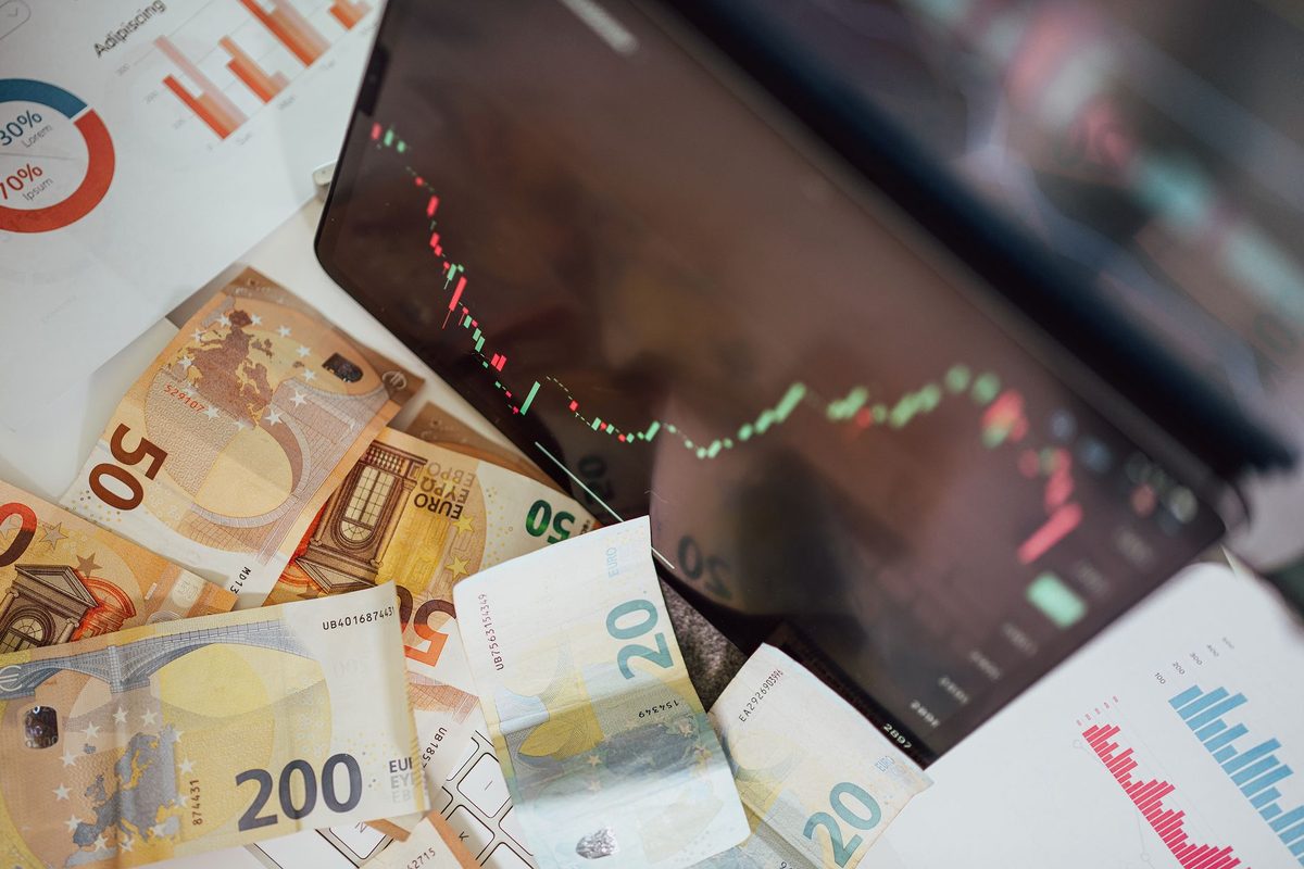 A diversified portfolio showing gold, bonds, and cash — recession-proofing strategy for 2026