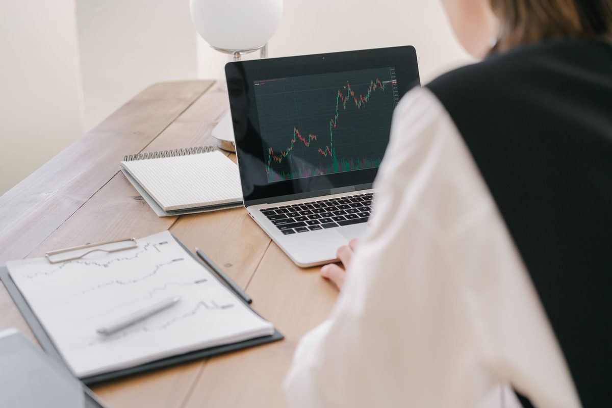 investor reviewing portfolio allocation on laptop in Q4 2026